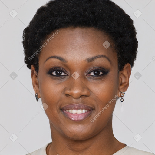 Joyful black young-adult female with short  black hair and brown eyes