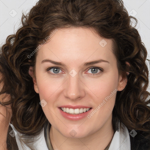 Joyful white young-adult female with medium  brown hair and green eyes