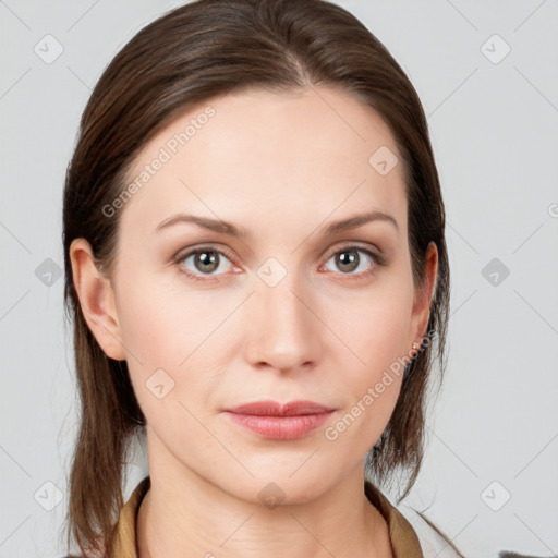 Neutral white young-adult female with medium  brown hair and grey eyes