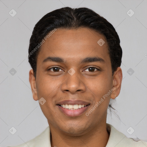 Joyful latino young-adult male with short  black hair and brown eyes