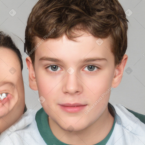 Joyful white child male with short  brown hair and brown eyes