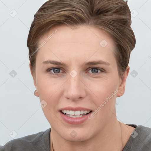 Joyful white young-adult female with short  brown hair and grey eyes