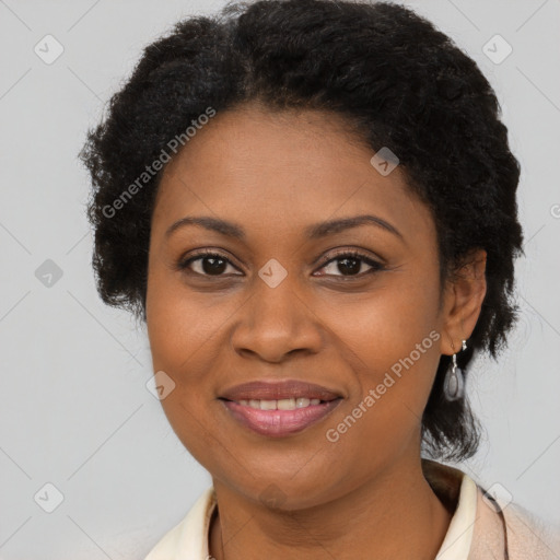 Joyful latino adult female with short  brown hair and brown eyes