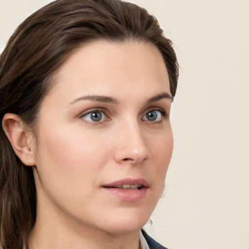 Neutral white young-adult female with long  brown hair and grey eyes