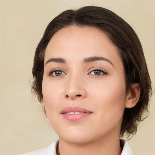 Neutral white young-adult female with medium  brown hair and brown eyes