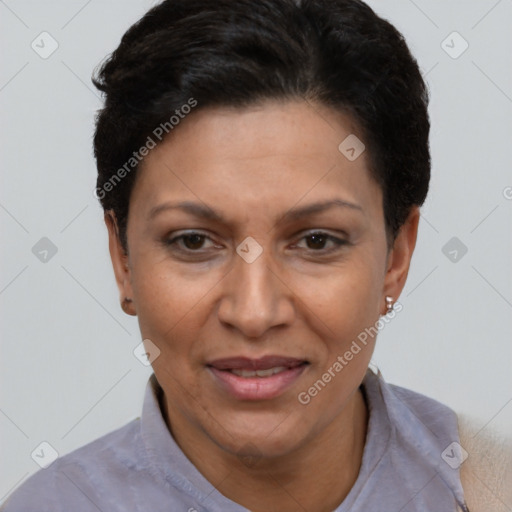 Joyful latino adult female with short  black hair and brown eyes