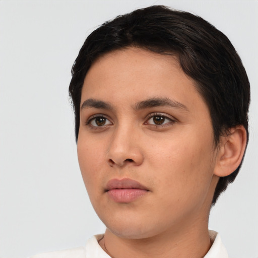 Neutral white young-adult female with short  brown hair and brown eyes