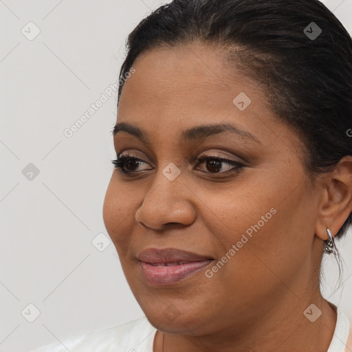 Joyful latino young-adult female with short  brown hair and brown eyes