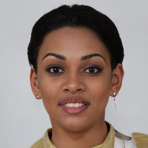 Joyful asian young-adult female with short  black hair and brown eyes
