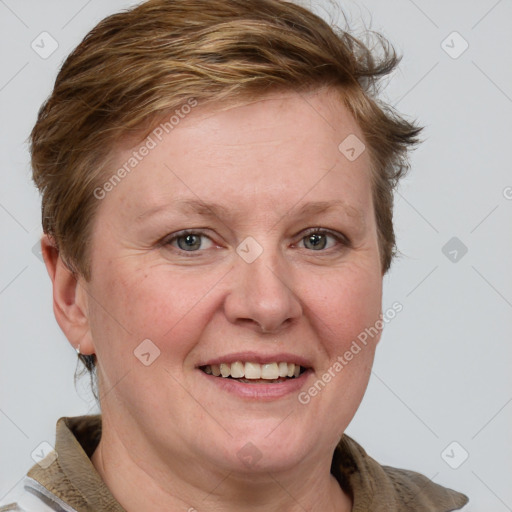 Joyful white adult female with medium  brown hair and blue eyes