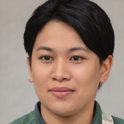 Joyful asian young-adult female with short  black hair and brown eyes