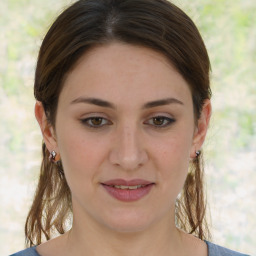 Joyful white young-adult female with medium  brown hair and brown eyes