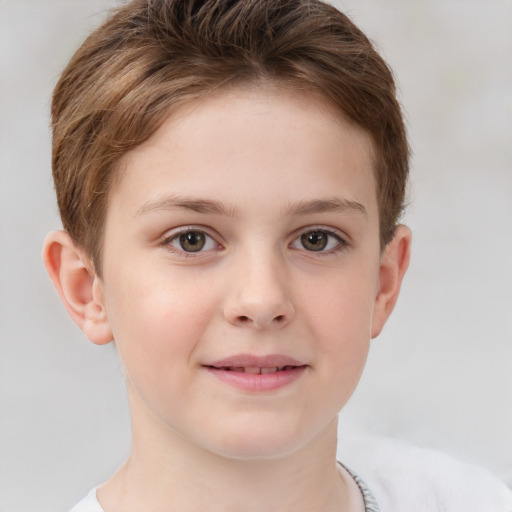 Joyful white child female with short  brown hair and brown eyes