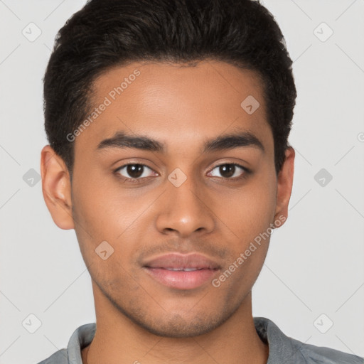 Joyful latino young-adult male with short  brown hair and brown eyes