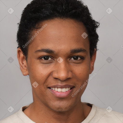 Joyful black young-adult male with short  brown hair and brown eyes