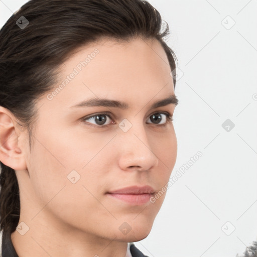 Neutral white young-adult female with medium  brown hair and brown eyes