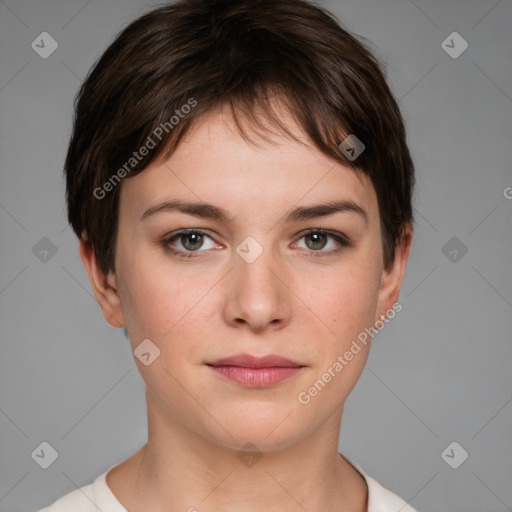 Joyful white young-adult female with short  brown hair and grey eyes