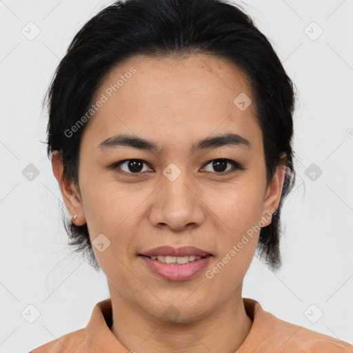 Joyful asian young-adult female with medium  brown hair and brown eyes