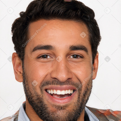 Joyful white young-adult male with short  black hair and brown eyes