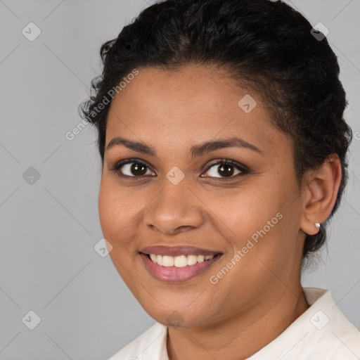 Joyful latino young-adult female with short  brown hair and brown eyes