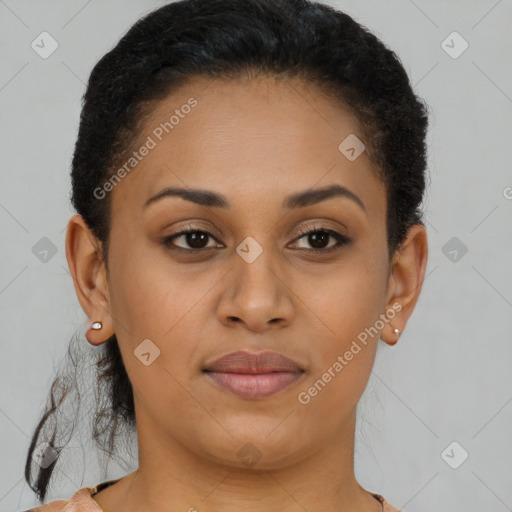 Joyful black young-adult female with short  brown hair and brown eyes