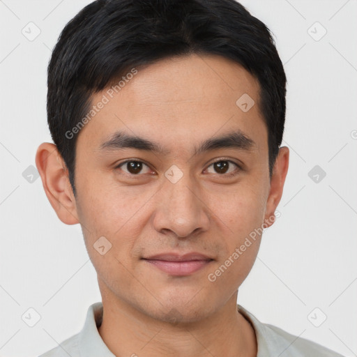 Joyful asian young-adult male with short  black hair and brown eyes