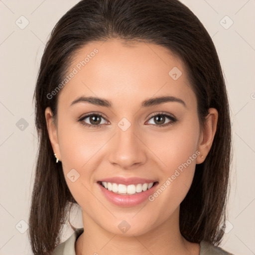 Joyful white young-adult female with long  brown hair and brown eyes