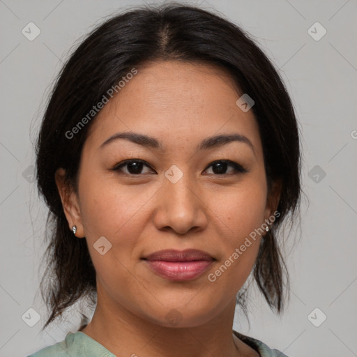 Joyful asian young-adult female with medium  brown hair and brown eyes