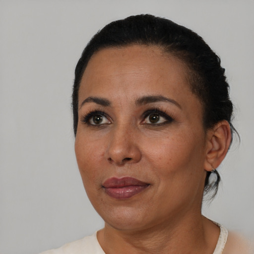 Neutral latino adult female with short  black hair and brown eyes