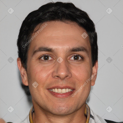 Joyful white adult male with short  brown hair and brown eyes