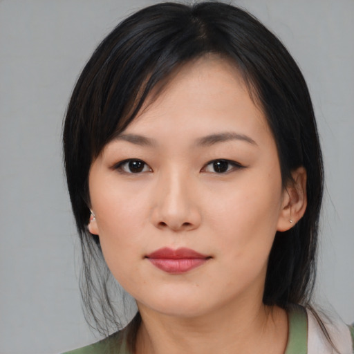 Neutral asian young-adult female with medium  black hair and brown eyes