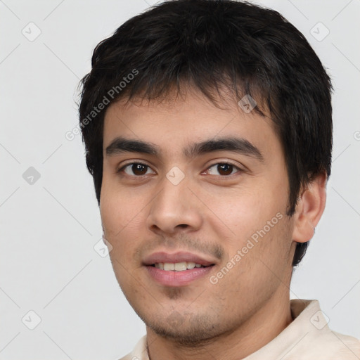 Joyful white young-adult male with short  black hair and brown eyes