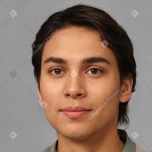 Joyful white young-adult male with medium  brown hair and brown eyes