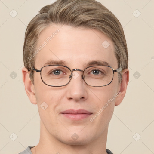 Joyful white adult male with short  brown hair and grey eyes