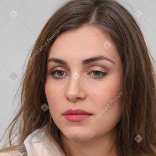 Neutral white young-adult female with long  brown hair and brown eyes