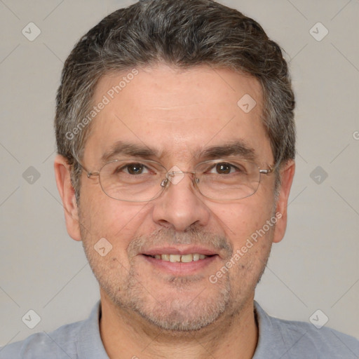 Joyful white middle-aged male with short  brown hair and brown eyes