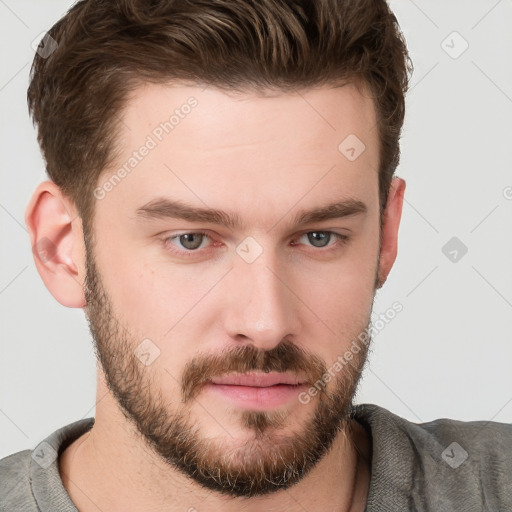 Neutral white young-adult male with short  brown hair and grey eyes