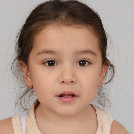 Neutral white child female with medium  brown hair and brown eyes