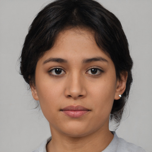 Neutral asian young-adult female with medium  black hair and brown eyes