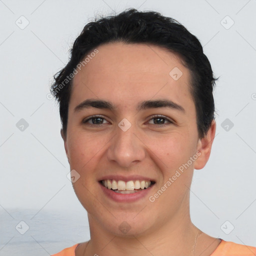 Joyful white young-adult male with short  black hair and brown eyes