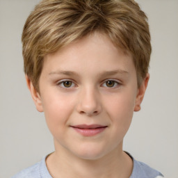 Joyful white child female with short  brown hair and brown eyes