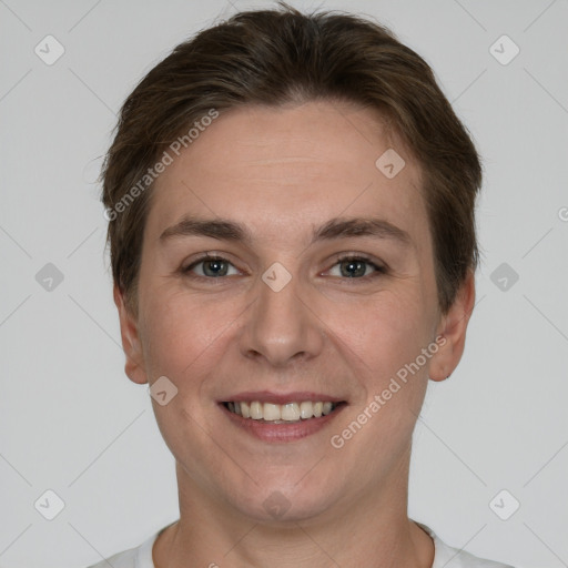 Joyful white young-adult female with short  brown hair and grey eyes