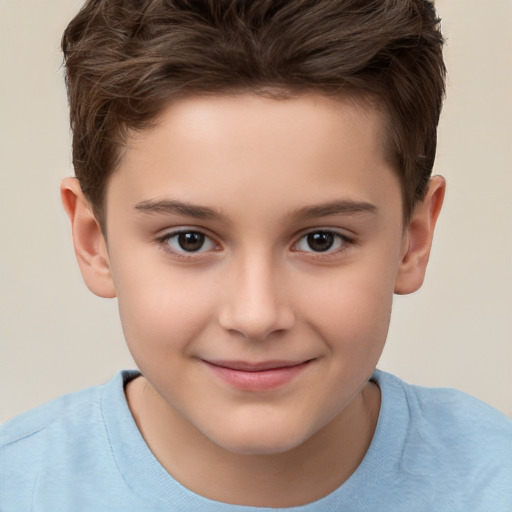 Joyful white child male with short  brown hair and brown eyes