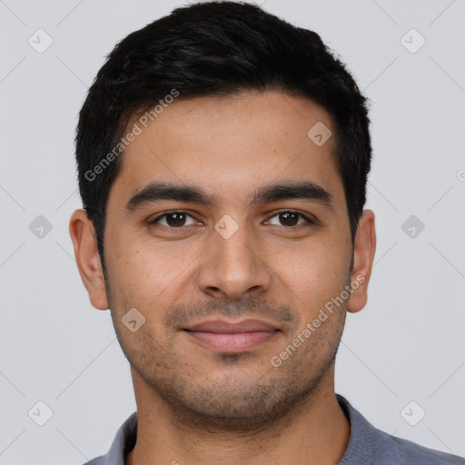 Joyful latino young-adult male with short  black hair and brown eyes