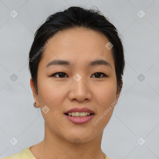 Joyful asian young-adult female with short  brown hair and brown eyes