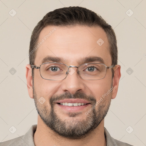 Joyful white adult male with short  brown hair and brown eyes