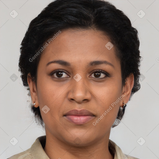 Joyful latino young-adult female with short  brown hair and brown eyes