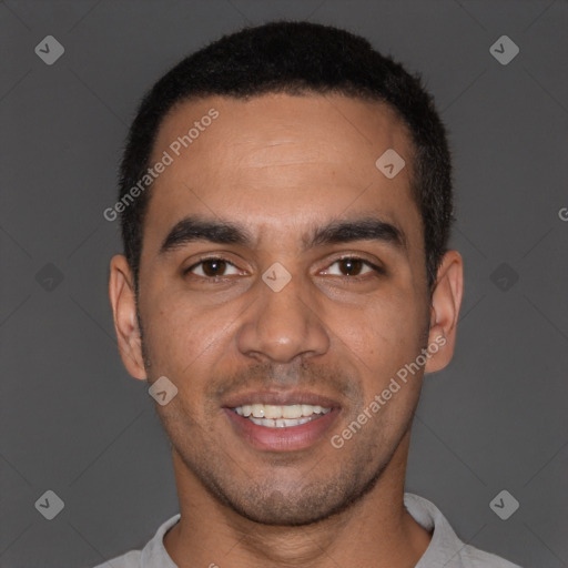 Joyful black young-adult male with short  black hair and brown eyes