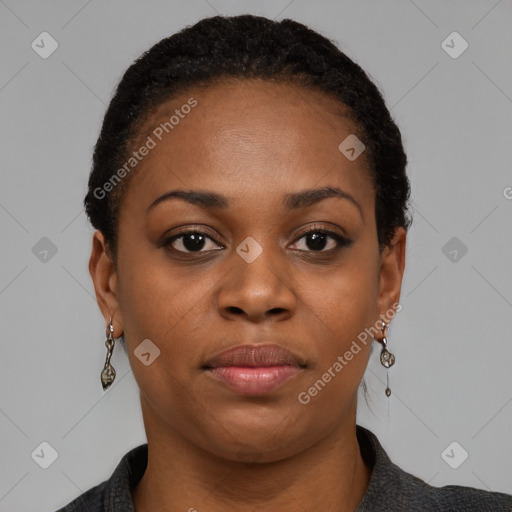 Joyful black young-adult female with short  black hair and brown eyes