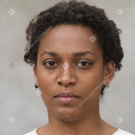 Neutral black young-adult female with short  brown hair and brown eyes